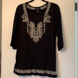 Black shirt with white and gold embroidery
